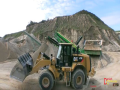 Video: Cat 972K e Volvo L180F al lavoro