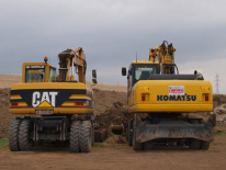 Caterpillar Vs Komatsu